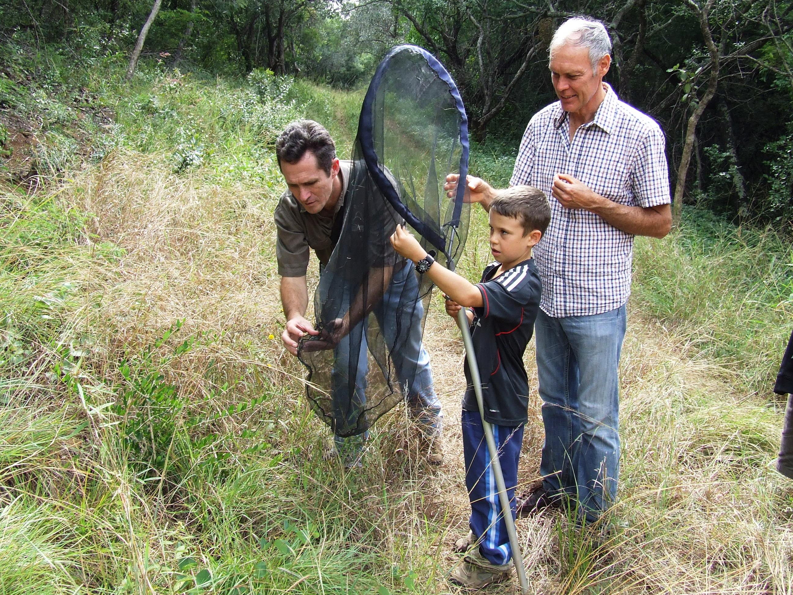 Lepidoptera lords: (from left) Herbert Otto from the Lepidopterists’ Society of South Africa and Shane Burns, from Whytethorn private herbarium and co-author of Field Guide to the Orchids of Northern South Africa and Swaziland are helping Hayden Loffler with his insect catch.