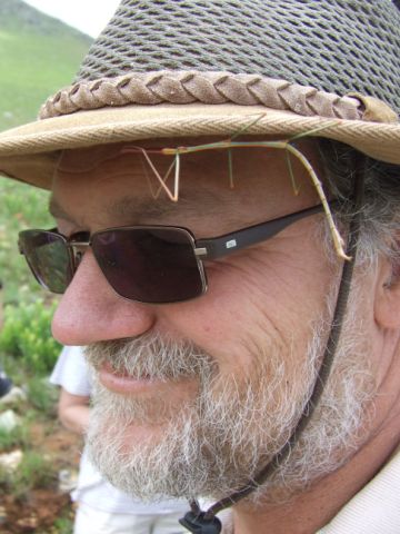 Prof Kevin Balkwill from Wits University with a stick insect keeping him company. 