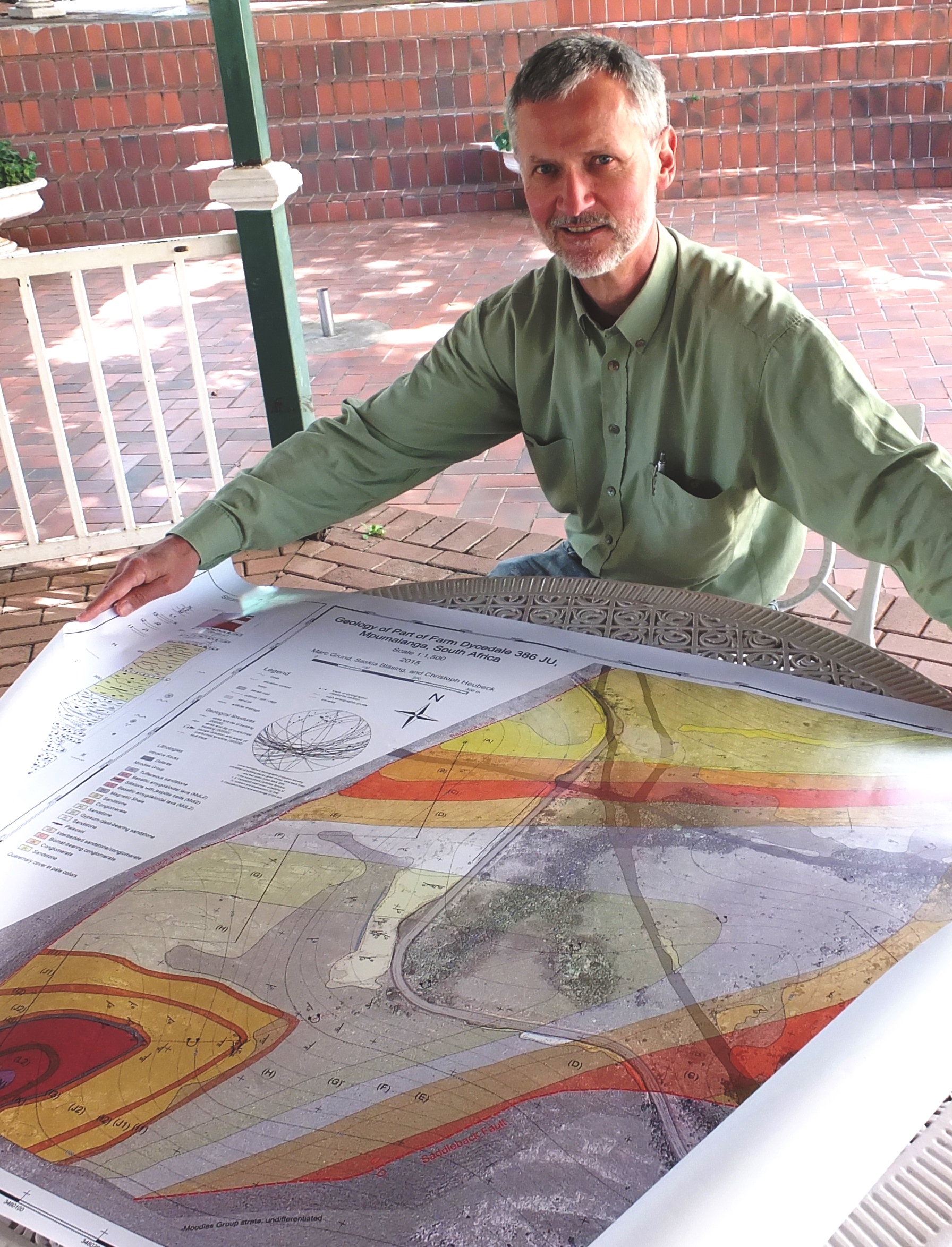 Prof Christoph Heubeck with a copy of the new map